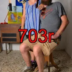 703r